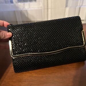 Elegant Black Clutch designed for those special occasions - preloved